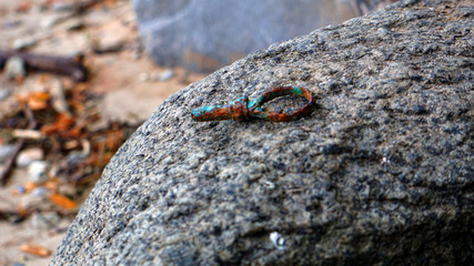 Rusty old artefact on a stone