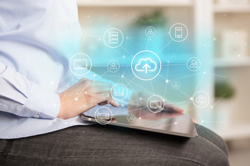 Business woman using tablet with network security and online storage system concept