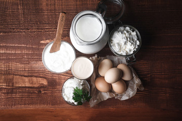 Healthy food high in protein. milk eggs cheese sour cream