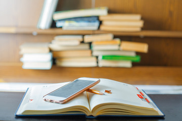 Education concept. Stack of books on table.