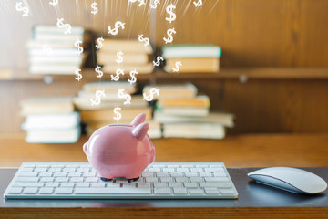 Pig money box on table