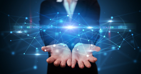 Handsome person holding hologram screen displaying modern cloud based web system technology