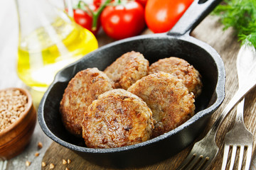 Buckwheat  burgers on the pan