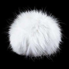 White pompom isolated on black