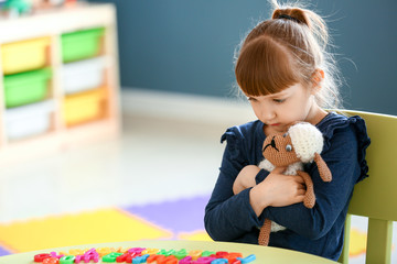 Little girl with autistic disorder in playroom