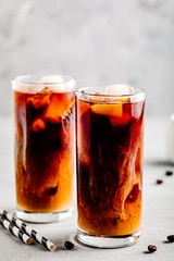 Almond milk cold brew coffee latte in tall .glasses
