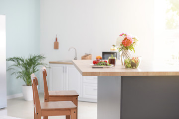 Set table in light modern kitchen