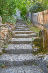 Fototapeta na wymiar Stairs made of stones in a medieval city