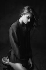 Black and white portrait of a girl made in studio