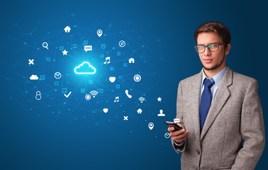 Young person using phone with cloud technology and online communication concept