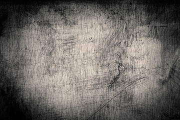 Scratched dirty dusty copper plate texture, black and white image.