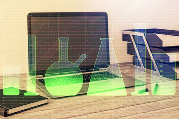 Laboratory flasks sketch hologram with desktop office background. Double exposure. Concept of education