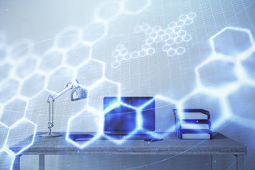 Fototapeta premium Technology theme hologram and desktop office computer background. Double exposure. Concept of high technology