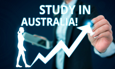 Conceptual hand writing showing Study In Australia. Concept meaning going into foreign country...