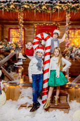 Fototapeta na wymiar kids with big christmas candy