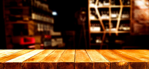 Desk of free space and blurred bar background 