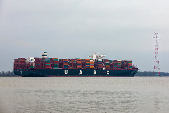 Hollern, Germany - December 15, 2015: Container ship AL ZUBARA on Elbe river. 