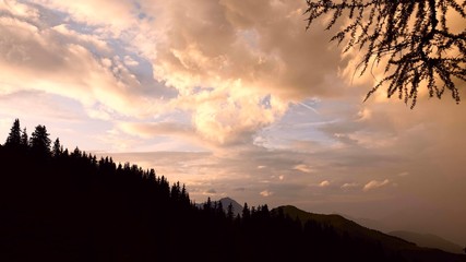 beautiful clouds on the sky over the mountains in the evening 