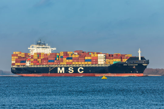 Hollern, Germany - December 29, 2017: Container ship MSC LAUSANNE on Elbe river. 