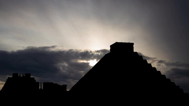Mexico: Mayn Piramid and Ruins, Time Lapse at Sunrise with Dark Silhouette and Colorful Sky, Chichen Itza, Yucatan