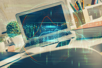 Multi exposure of chart and financial info and work space with computer background. Concept of international online trading.