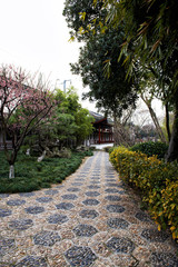 Visit the Gardens of Suzhou, China.