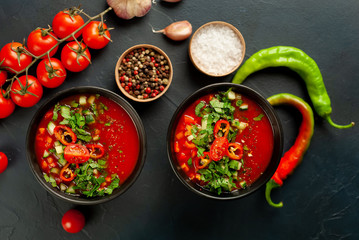 Traditional spanish cold tomato soup gazpacho on concrete background