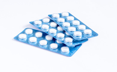 pills inside of blue tablet isolated