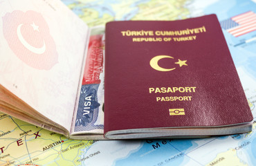 Turkish passport and dollar bills on US Map