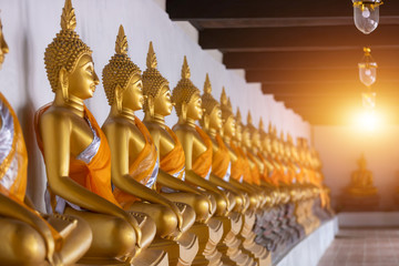 Buddha statue meditate in rows at Wat Putthaisawan temple in Ayutthaya, Thailand.