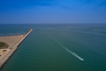 Aerial view lighthouse Punta Sabbioni Leuchtturm entrance in Venice, Italy. The main lighthouse at the entrance to the city of Venice. Resorts of Venice. Tourist place.