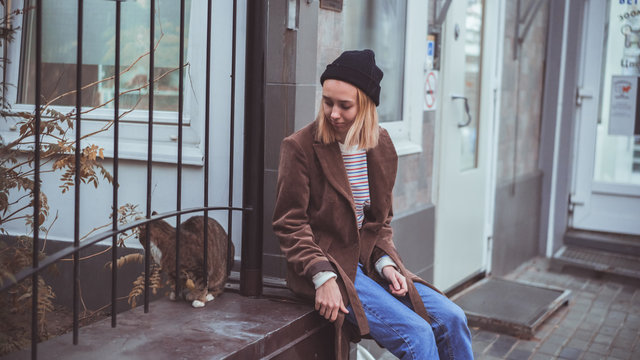 Homeless girl and cat