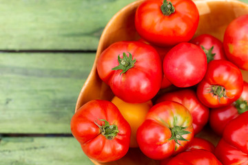 Tomato harvest in bamboo bowl