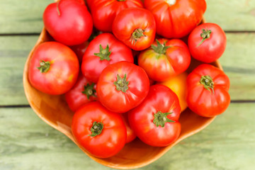 Tomato harvest in bamboo bowl