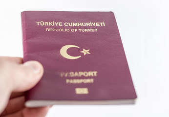 hand hold turkish passport