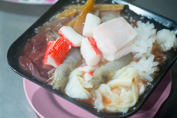Set of shabu fresh raw pork and squid shrimp fish seafood