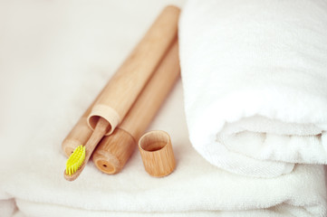 Bamboo toothbrushes on a shelf in the bathroom. Zero waste, eco, save planet