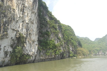 Leisure boat trip, sky, mountain and river