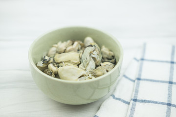 Raw oyster in bowl prepare for cooking.