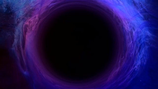 Ink swirl. Big bang. Universe origin. Blue purple fog circle motion.