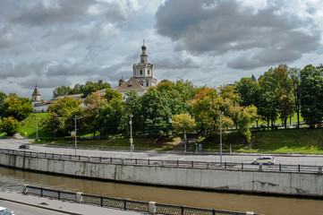 Fototapeta premium One of the oldest monasteries in Moscow, built on the high Bank of the Yauza river – a tributary of the Moscow river. The Archangel Church became the architectural dominant of the monastery.