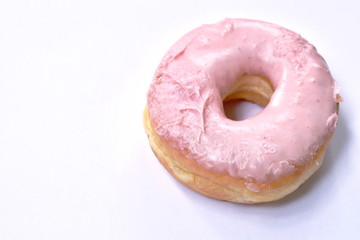 strawberry cream donuts on white background