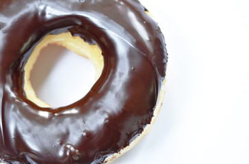 chocolate cream donuts on white background
