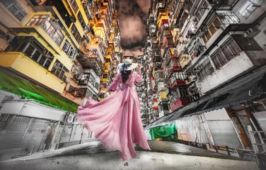Foto op Plexiglas Asian woman looking apartment building at Quarry Bay, Hong Kong. © chanchai