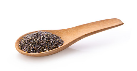 Chia seeds in wood spoon isolated with white background.