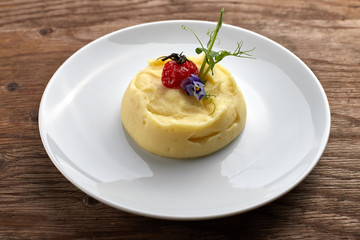 Mashed potatoes on a white plate