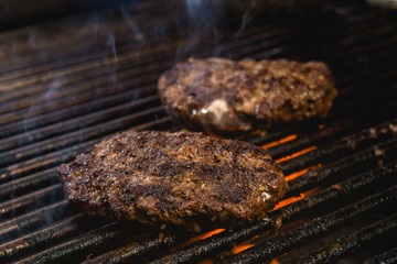 Smoking Hot Beef Burger on a Hot Grill