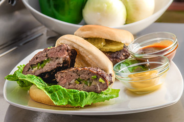 Fresh Beef Burger on a Stainless steel Table
