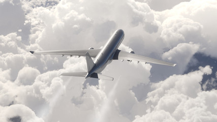 Obraz premium A passenger plane flying above the clouds