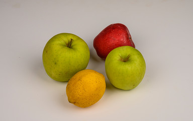 Ripe green and red apples on white background. Not isolate